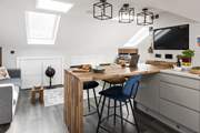 The breakfast-bar is perfect for sharing a meal or for catching up on any work.