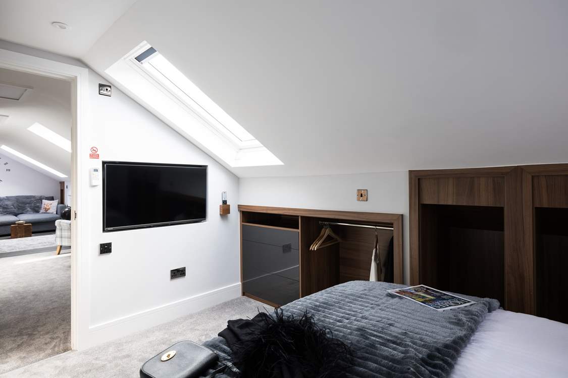 Plenty of places to hang your clothes and your own TV.