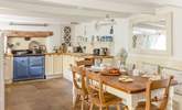 The cosy kitchen/diner is such a lovely spot for group meals.  - Thumbnail Image