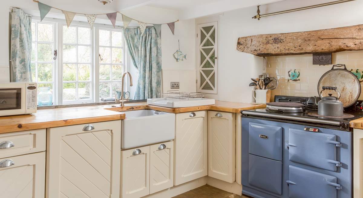 Enjoy looking over the pretty front garden from the kitchen sink. 