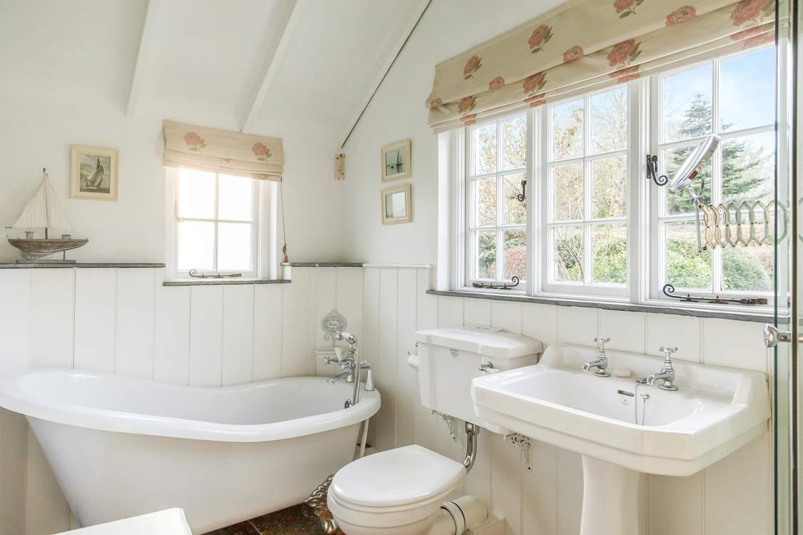 The family bathroom has a fabulous free-standing tub.