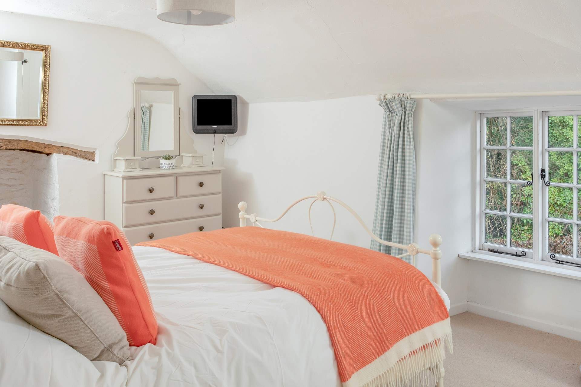 Enjoy long lazy mornings in this king-size bed. 