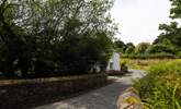 The bridge approaching the cottage.  - Thumbnail Image