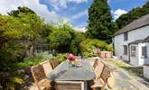 The sheltered sunny back garden. The hot tub can be hired by a separate company at an extra cost.  - Thumbnail Image