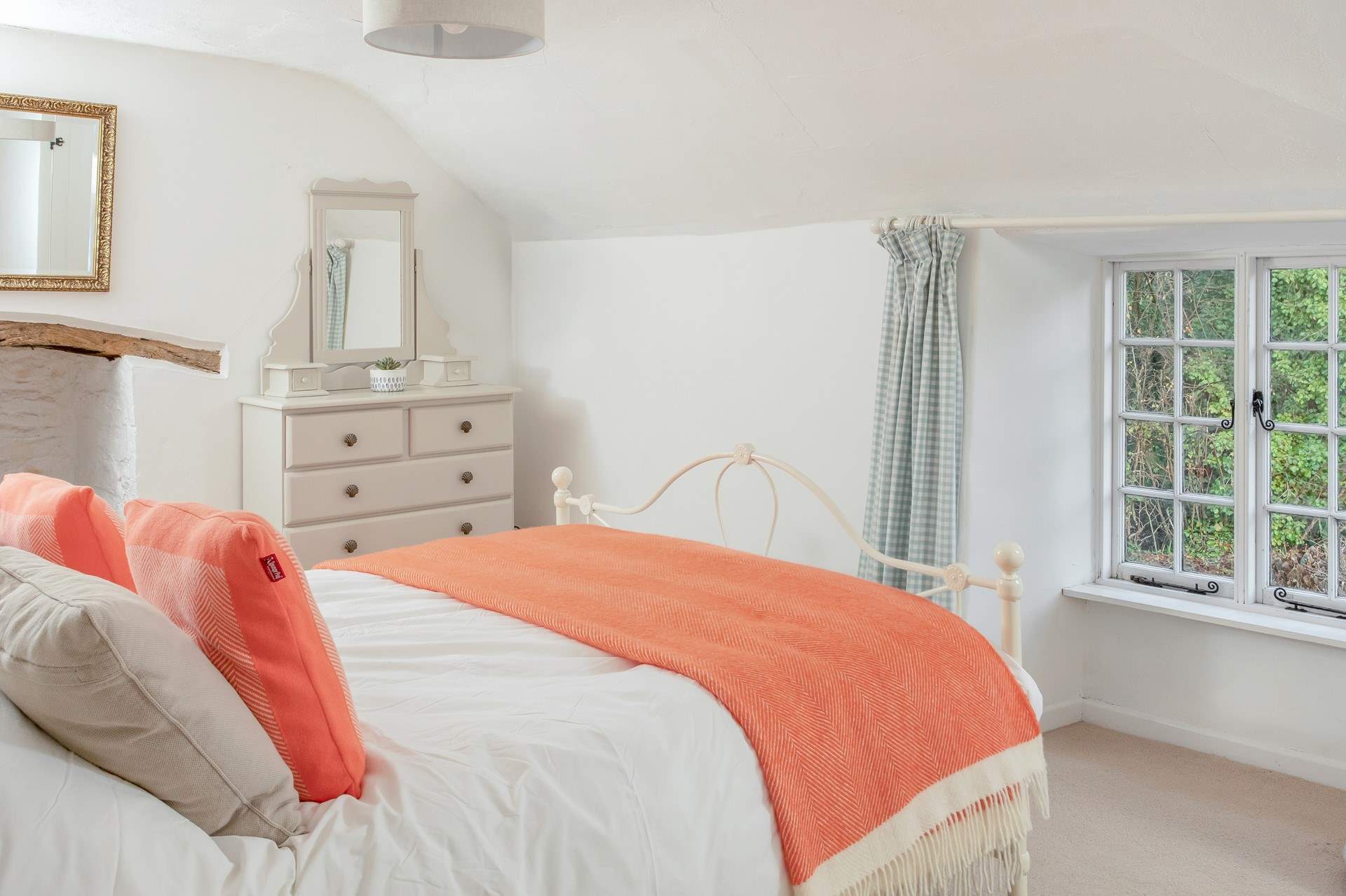 Enjoy long lazy mornings in this king-size bed. 