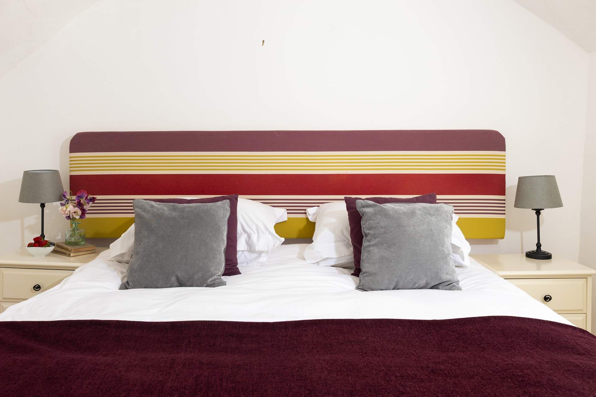 This bedroom has fun pops of colour. 