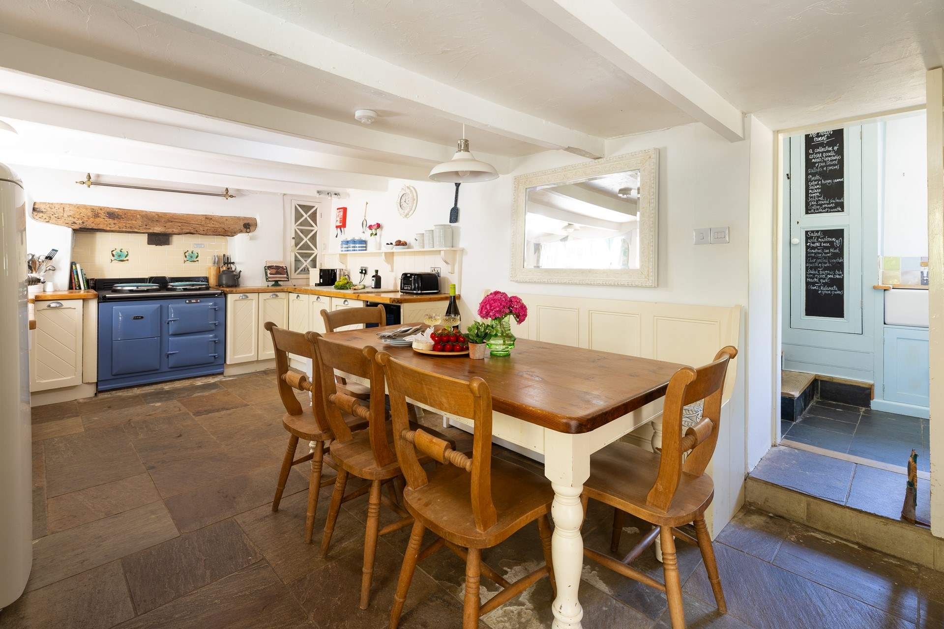 The perfect spot for long lazy meals, see if you can spot any pieces from the old chapel or ships in this room. 