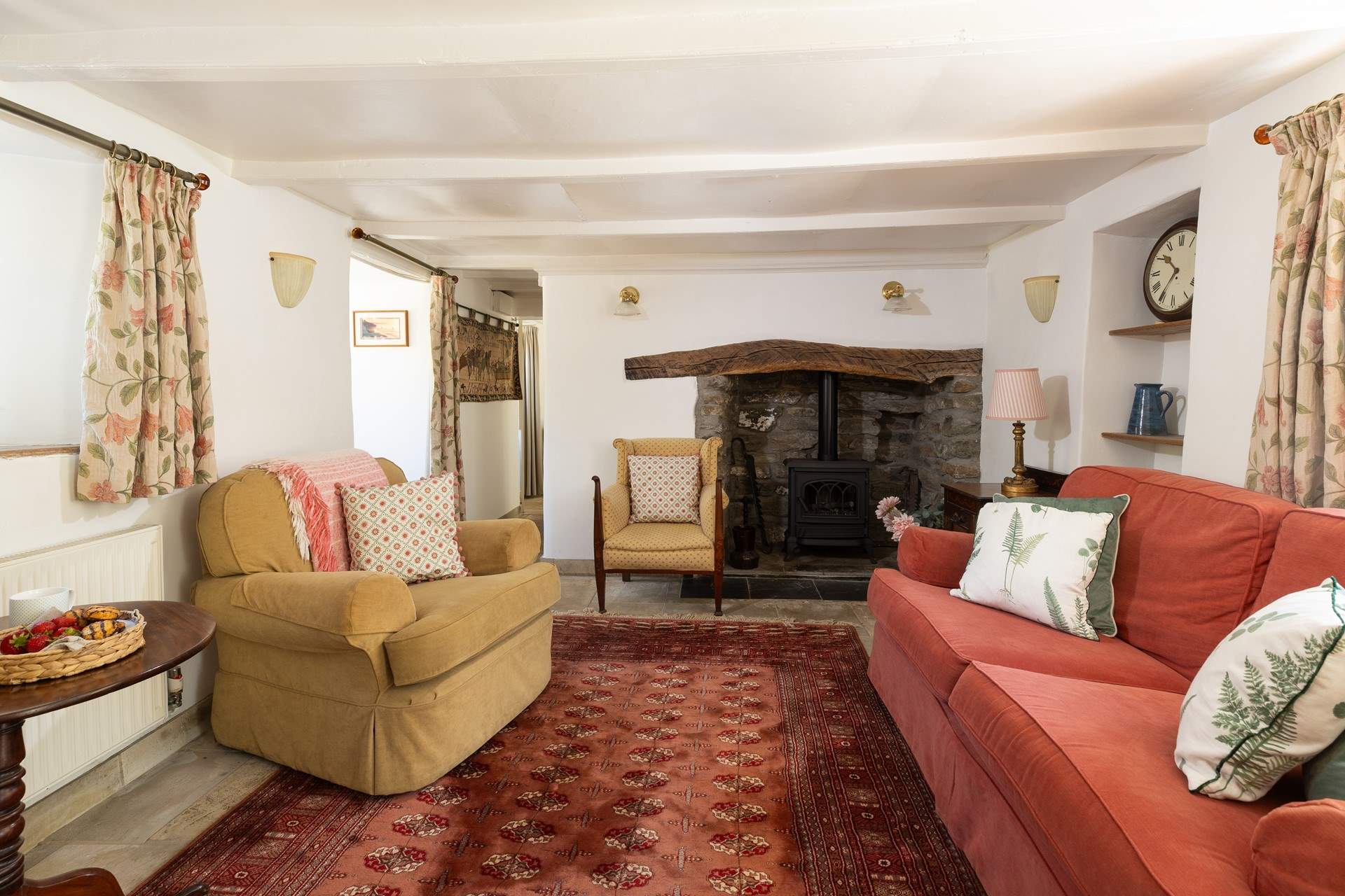 Both sitting-rooms are warm and inviting there is plenty of space for everyone to relax. Please note that this sitting-room now has a wood-burner effect electric stove