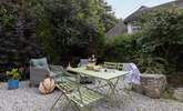 The pretty patio catches the afternoon sun. - Thumbnail Image