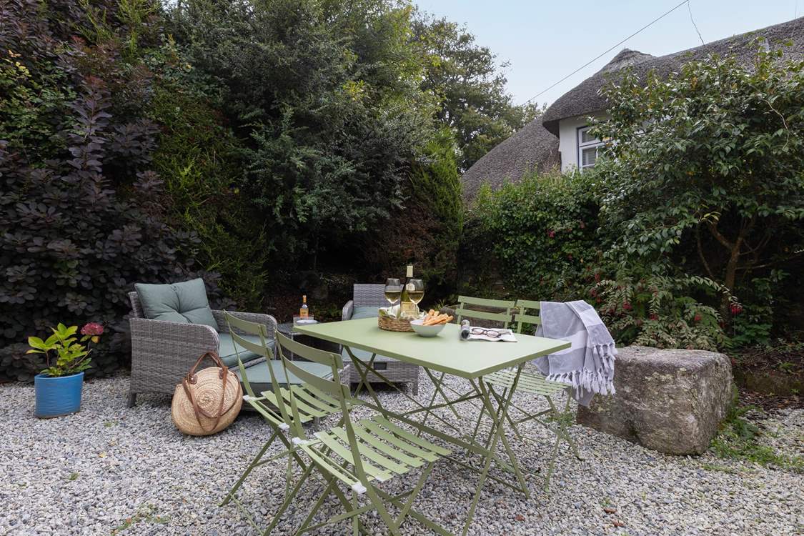 The pretty patio catches the afternoon sun.