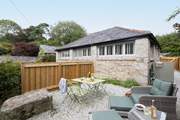 Wander out through the bedroom doors to access this lovely enclosed space.