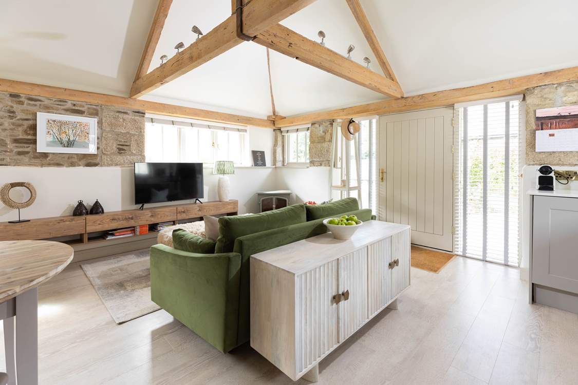 The original beams and exposed stonework are just stunning.