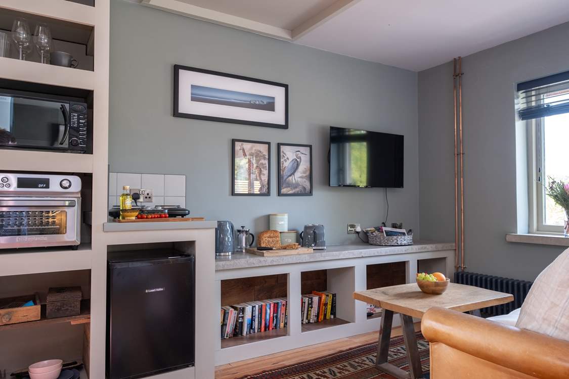 There isn't an oven in the kitchenette but you do have an air fryer, electric two ring hob and microwave.