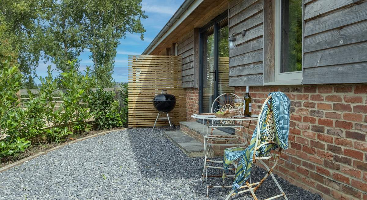 With a charcoal barbecue, this is the perfect spot for some al fresco dining.