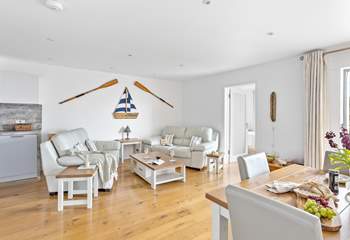 Open plan living is the order of the day at our charming seaside apartment.