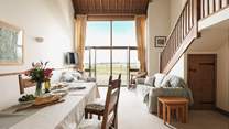 The spacious sitting/dining-room.