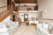 A delightful galleried landing runs across the width of the barn.