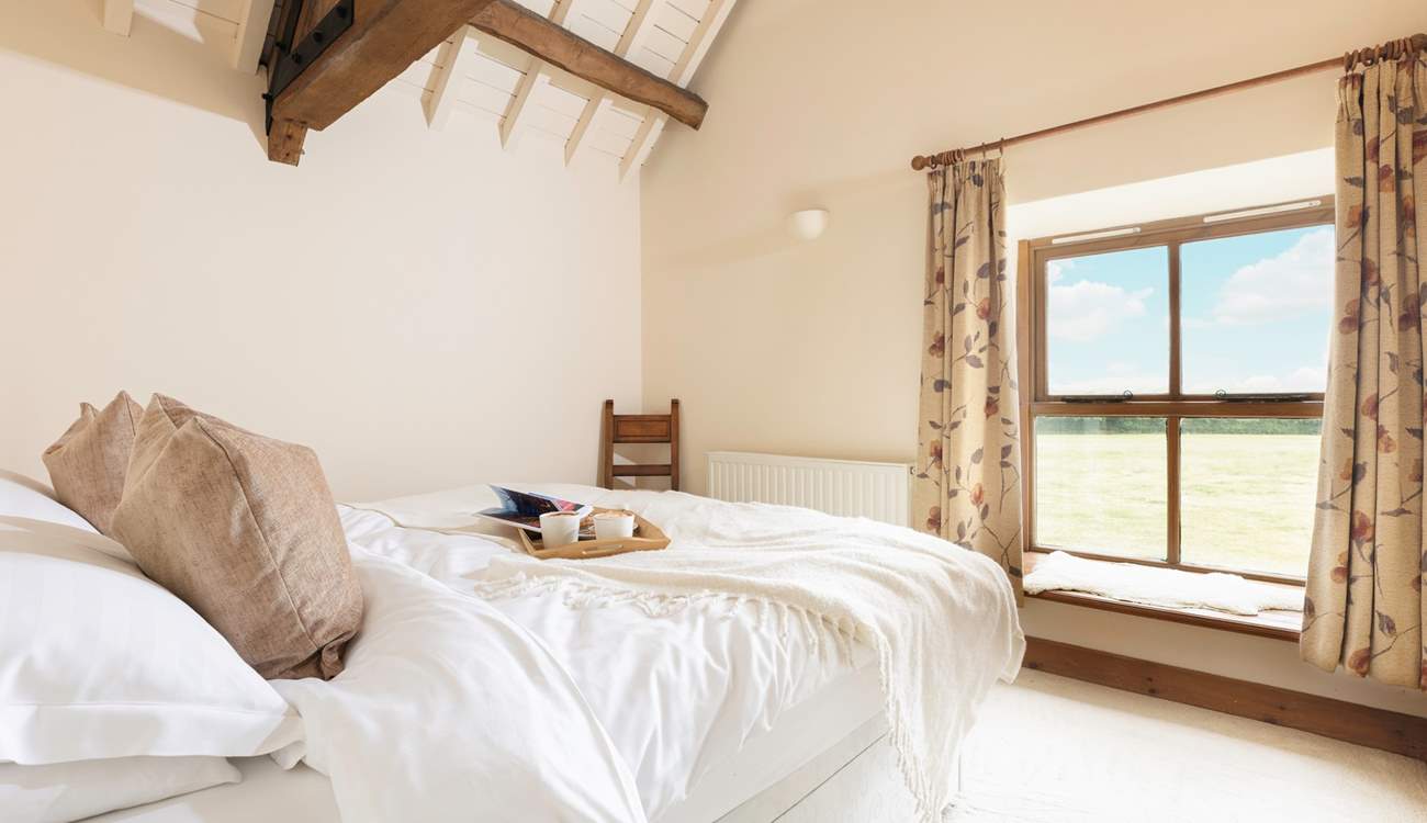 You won't want to leave this serene and inviting bedroom.