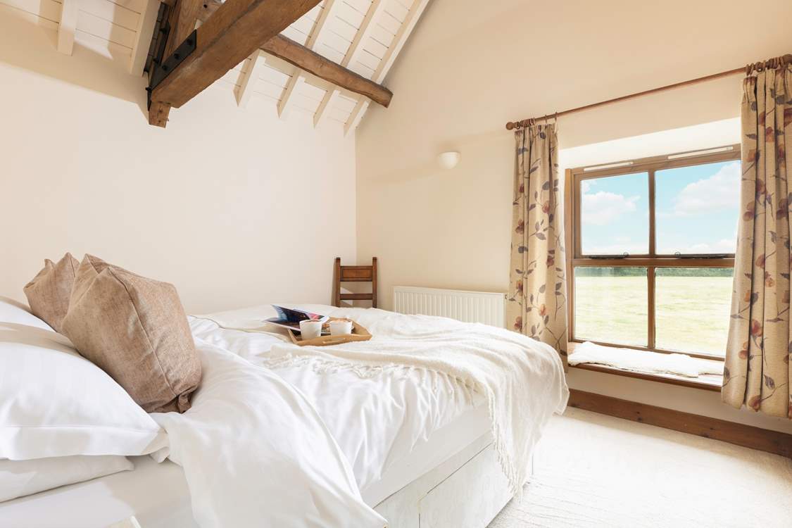 You won't want to leave this serene and inviting bedroom.