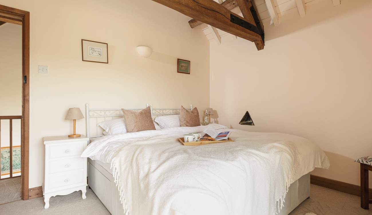 Enjoy the original exposed beams in the upstairs bedroom.