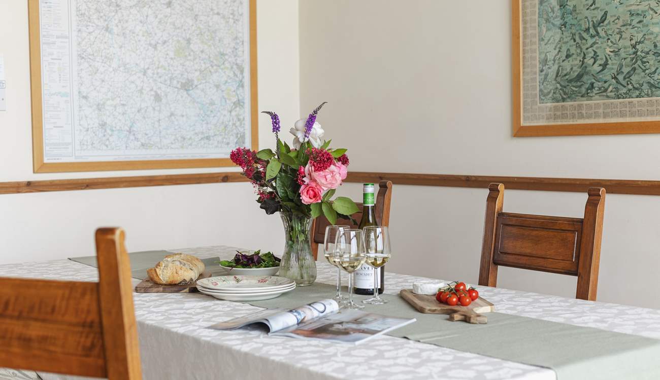 Share a delicious meal around the spacious dining-table.