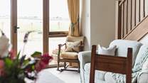Relax on the rocking chair and feel your worries slip away.