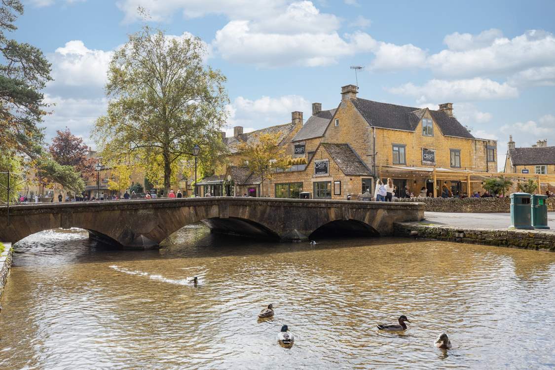 Bourton-on-the-Water is a popular destination with the gently flowing River Windrush running through the centre of the village and crossed by attractive little bridges.