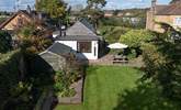 Enjoy the large yet secluded gardens with your family and four-legged friend. - Thumbnail Image