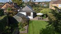 Enjoy the large yet secluded gardens with your family and four-legged friend.