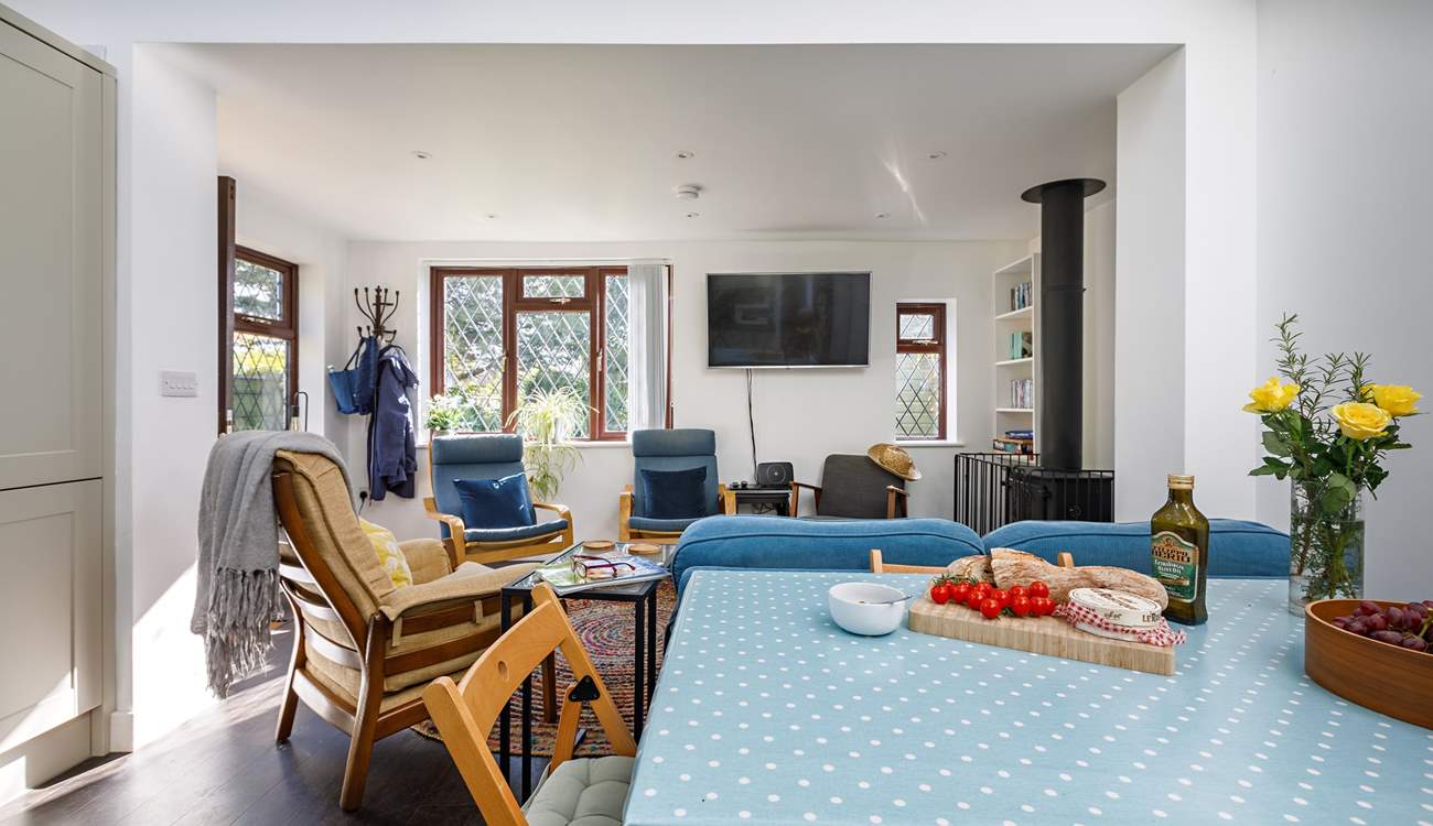 The sociable living area has a large dining-table.