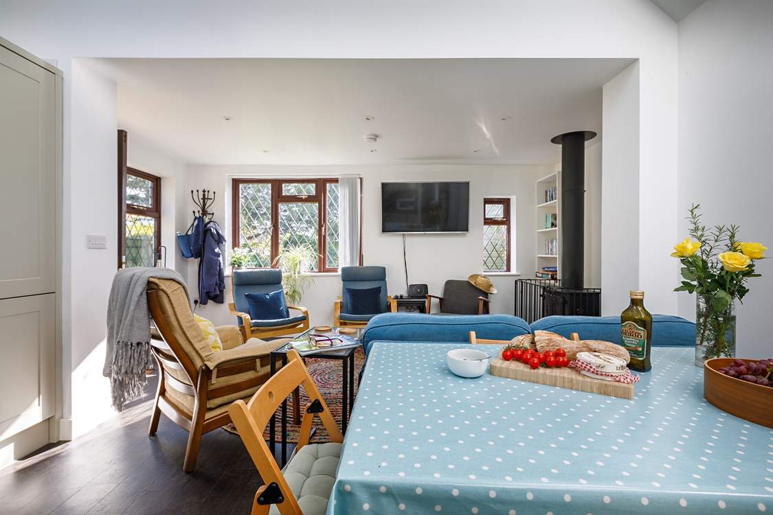 The sociable living area has a large dining-table.
