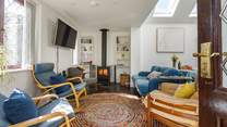 Cosy interiors and a warming wood-burner await.