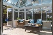 On cooler days the conservatory is perfect for morning coffee or afternoon tea.