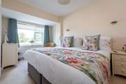 Bedroom 2 on the ground floor has a 'zip and link' bed, giving you the choice of a super-king double or twin beds.