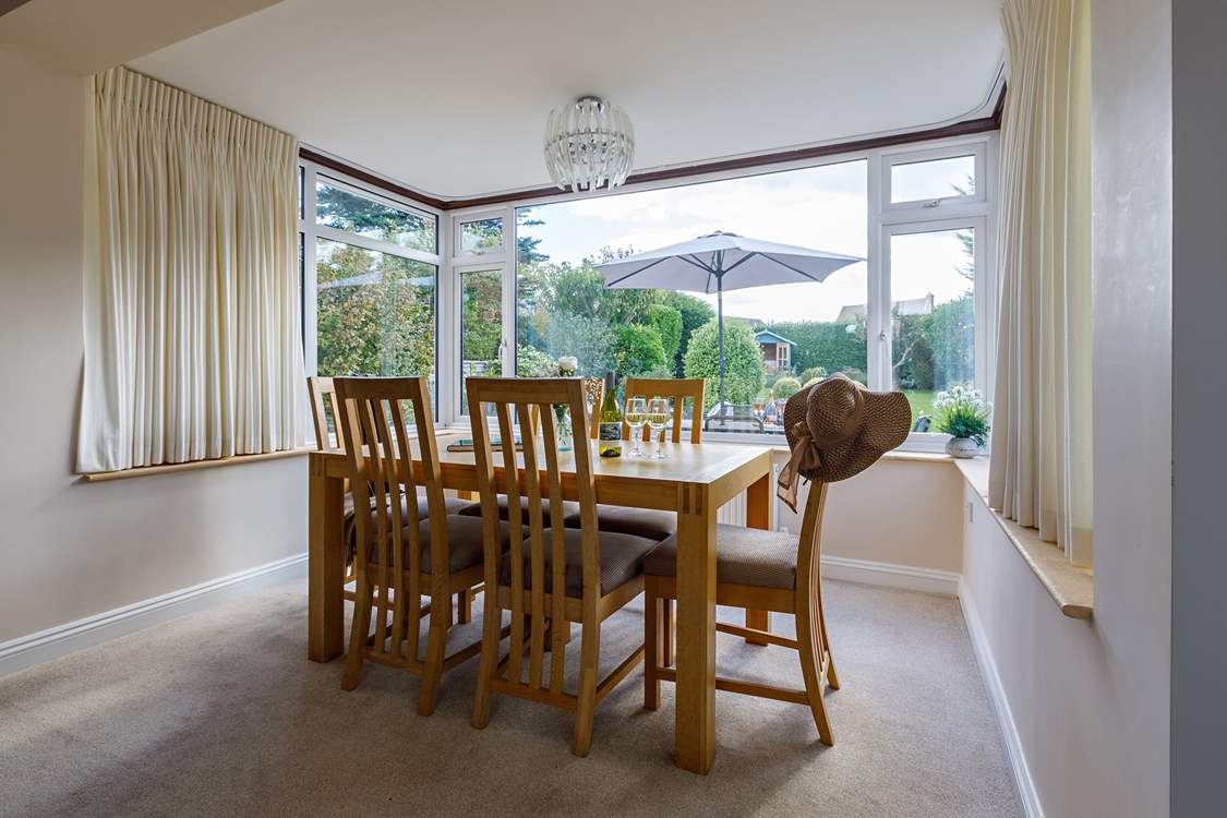 The dining-area overlooks the pretty garden.