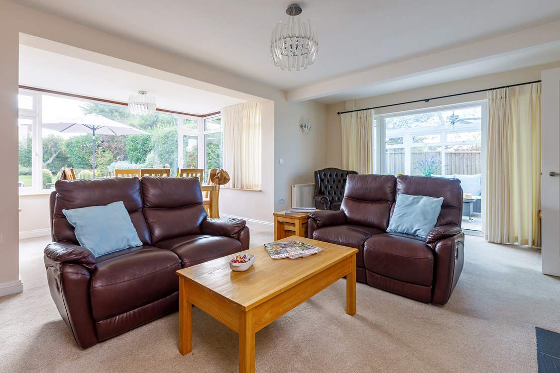 The sitting/dining-room is perfect for relaxing after a busy day exploring.