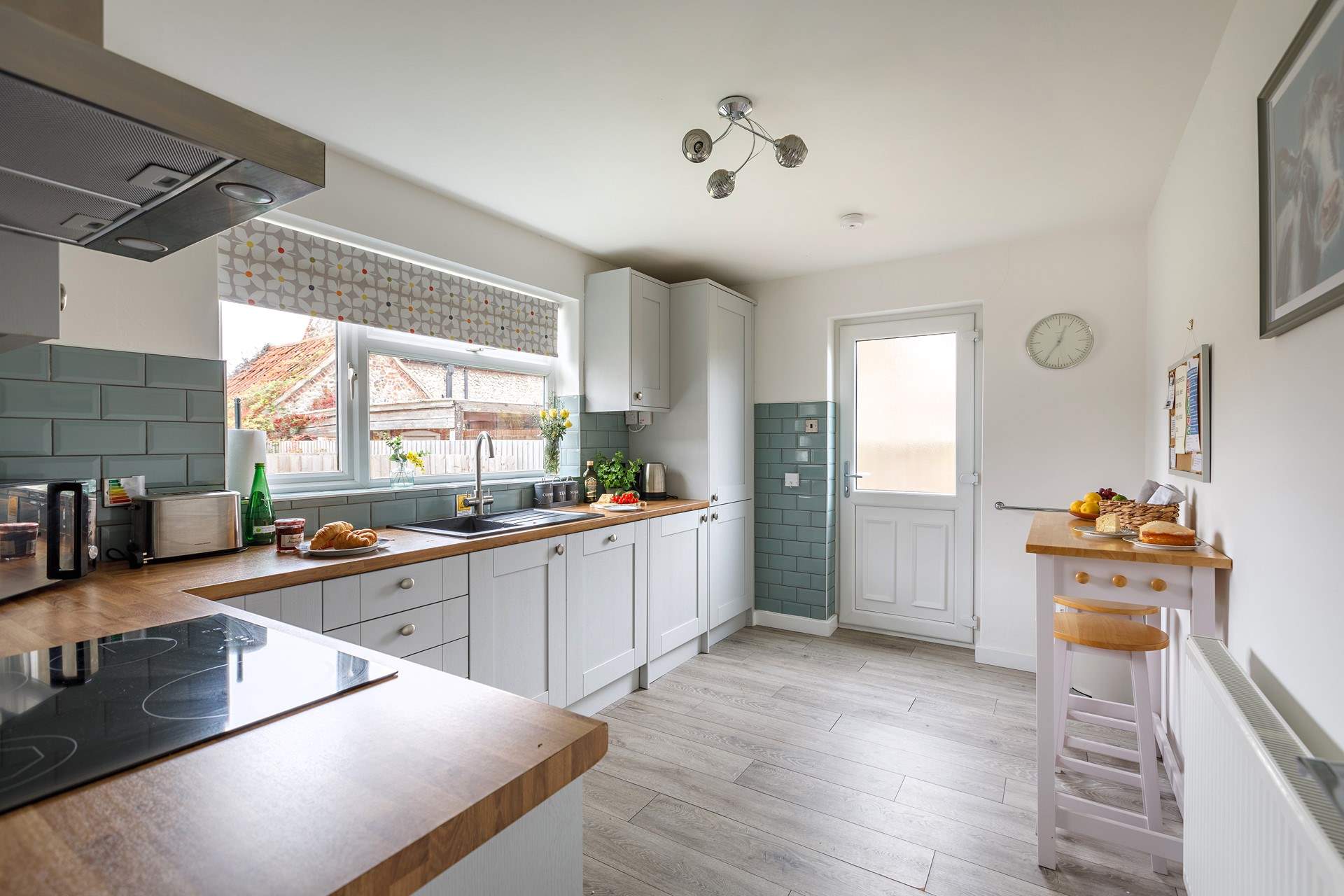 The kitchen is light and bright.