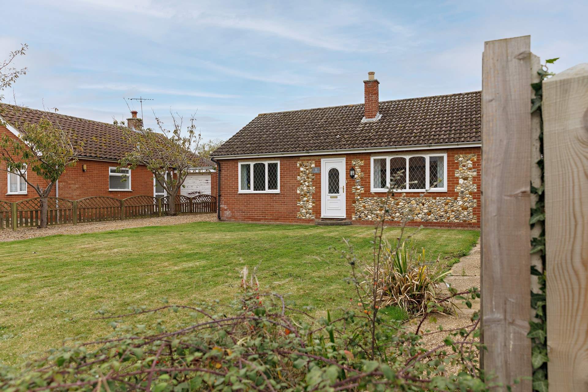 Sancia has a lawned garden to the front and rear.