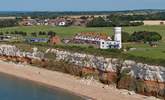 The lighthouse and iconic red and white striped cliffs at Hunstanton. - Thumbnail Image