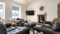 Relax on the sofa and catch a movie on the Smart TV.