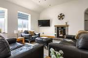 Relax on the sofa and catch a movie on the Smart TV.