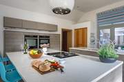 The kitchen-area has a handy island/breakfast-bar, perfect for chatting with the chef.
