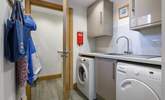 The handy utility-room has a washing machine and tumble-drier.  - Thumbnail Image