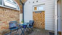 The secluded courtyard is perfect for al fresco dining. 