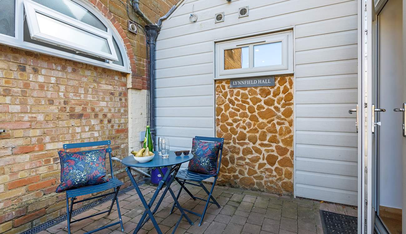 The secluded courtyard is perfect for al fresco dining. 