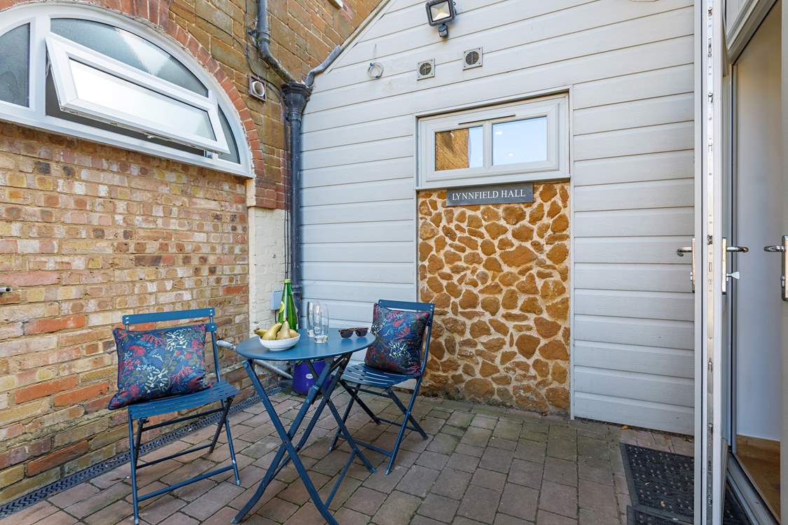 The secluded courtyard is perfect for al fresco dining.