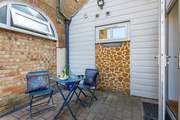 The secluded courtyard is perfect for al fresco dining.