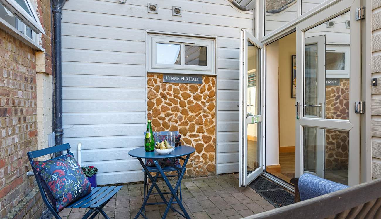 Access to the courtyard is from the living-room.