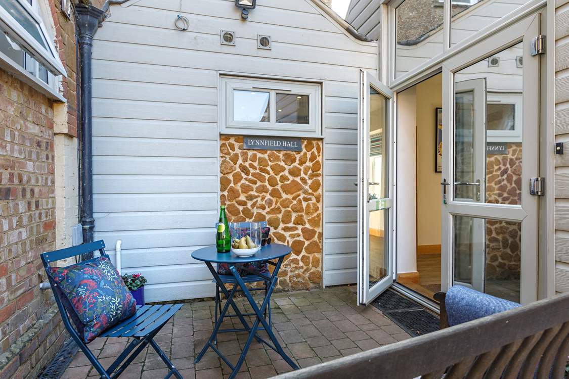 Access to the courtyard is from the living-room.