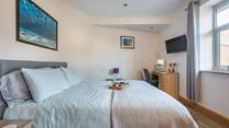 Both bedrooms have the luxury of a Smart TV.